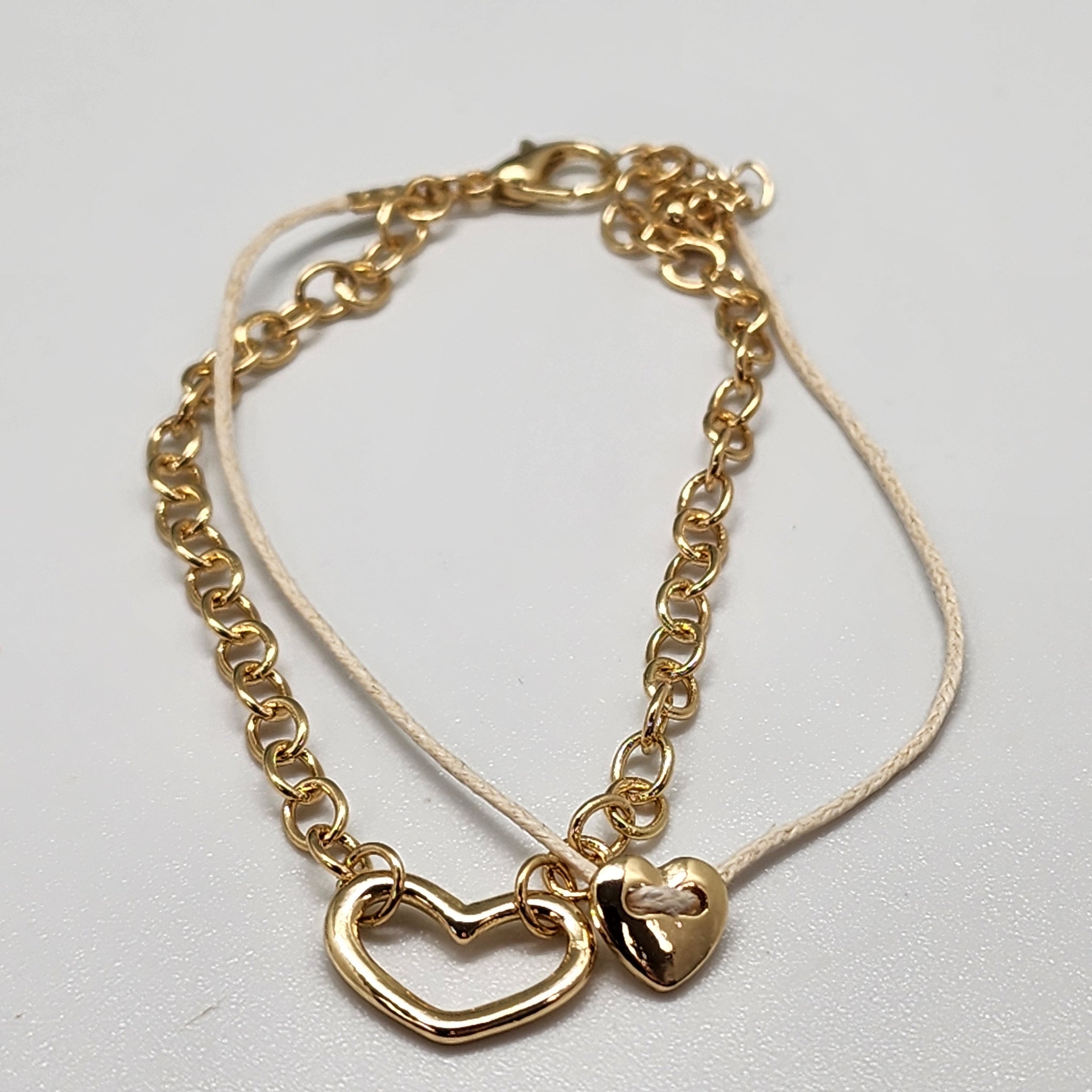 Baby Heart tan cord layered bracelet